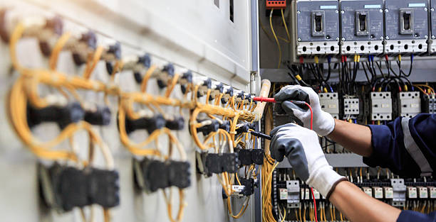 Professional Electrician technician working in Cumming, GA